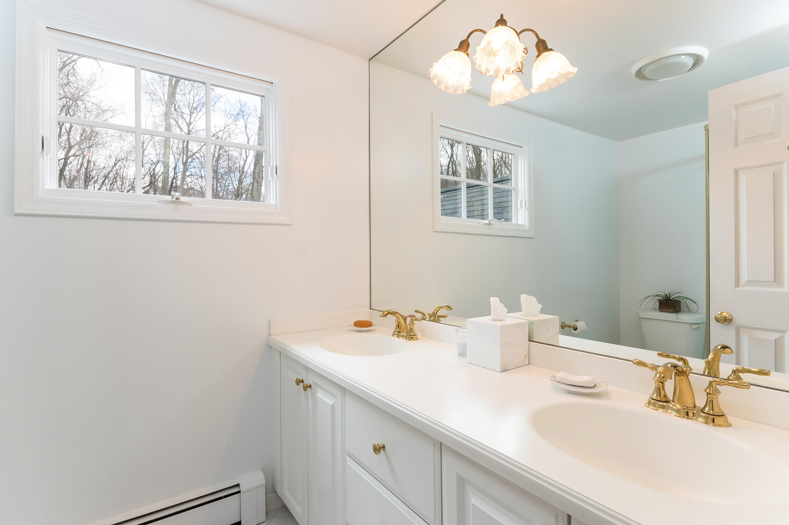 7 Briar Brae Road Darien, CT 06820 - Photo 23 of 35 a bathroom with a sink and a mirror