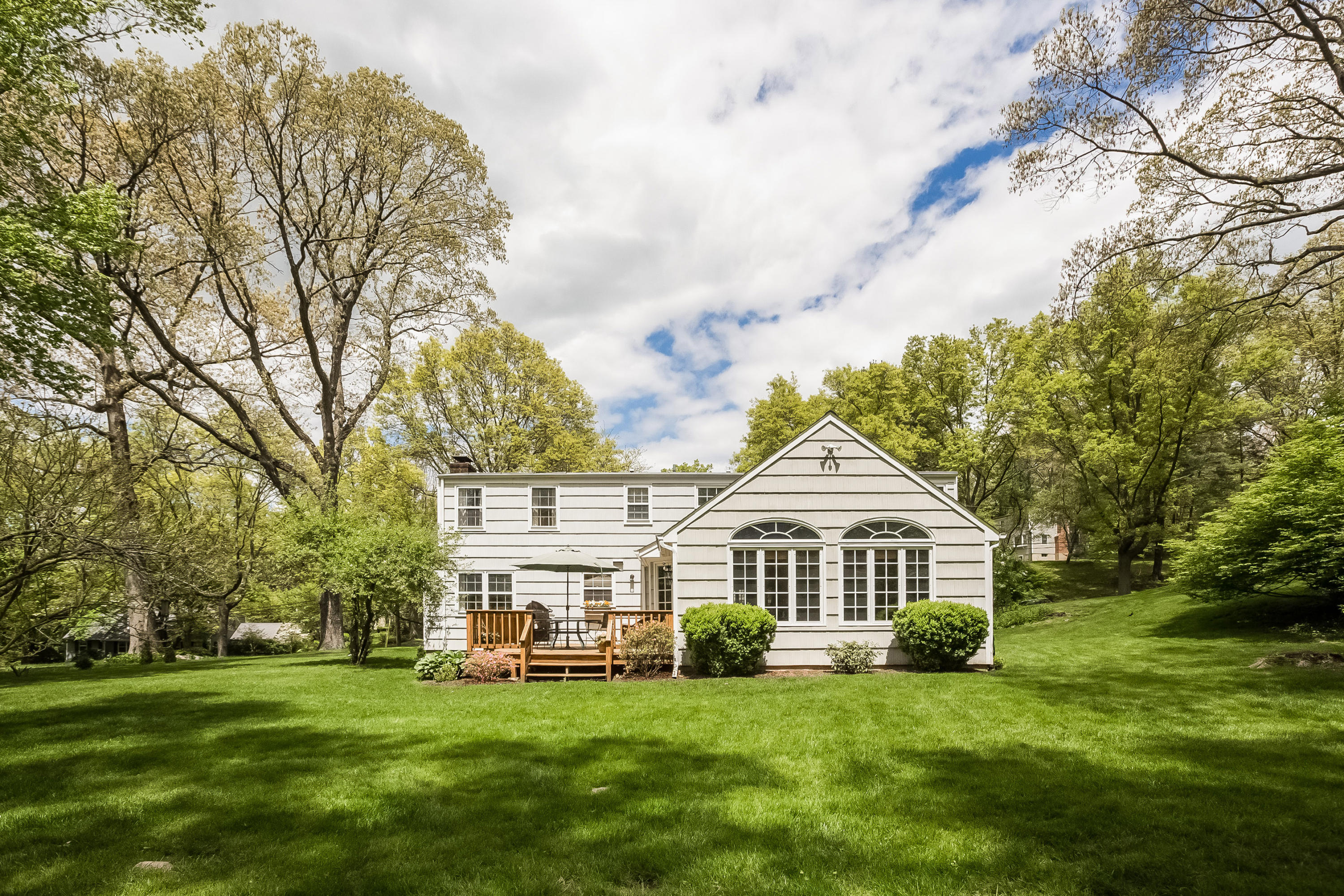 7 Briar Brae Road Darien, CT 06820 - Photo 32 of 35 a front view of a house with a garden