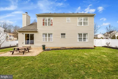 a front view of a house with patio