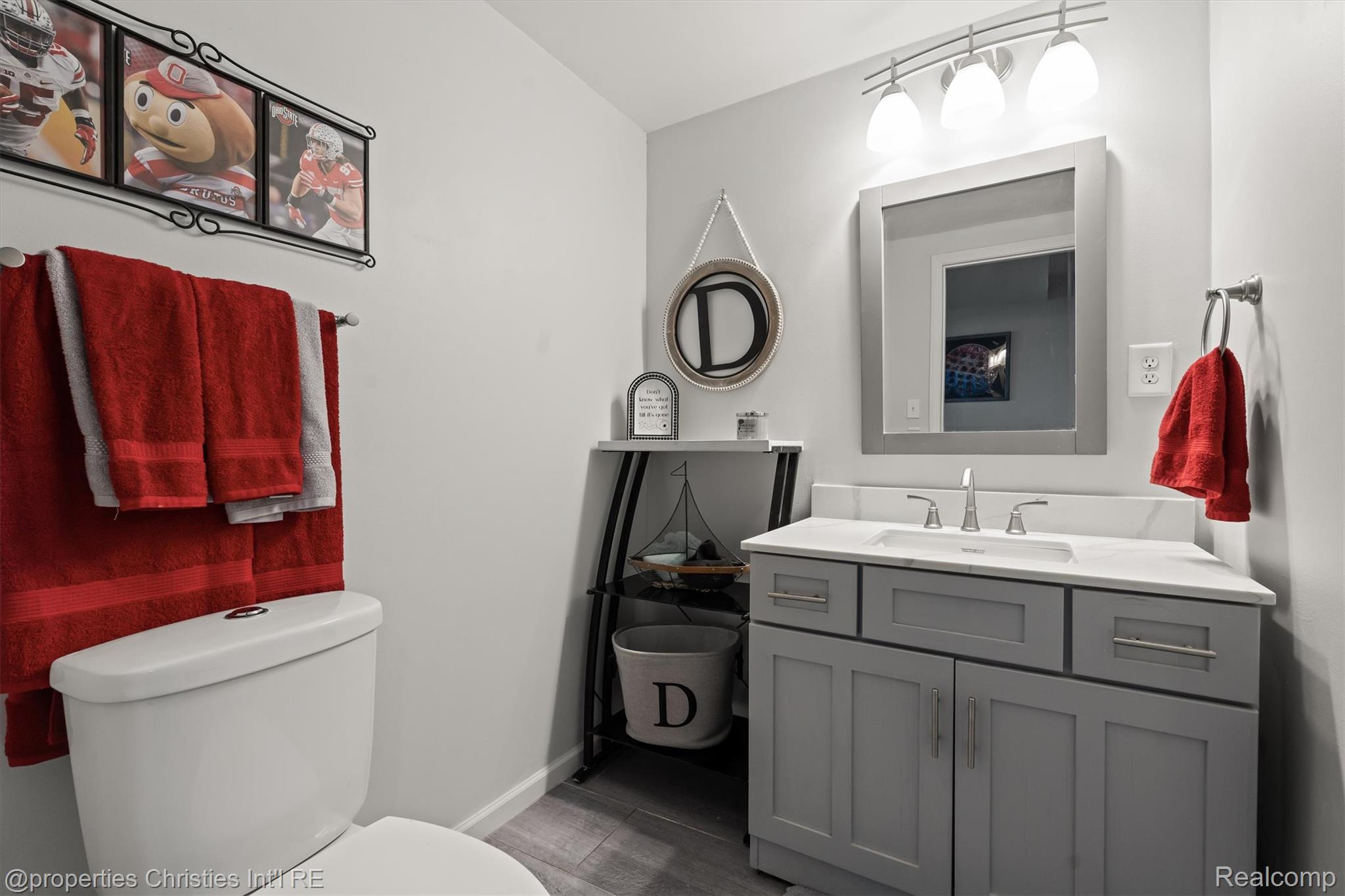 2721 Maize Loop Saline, MI 48176 - Photo 31 of 52 Bathroom with vanity and toilet