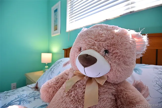 a view of a backyard with sitting area