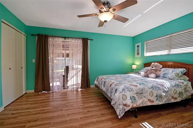 a bathroom with a sink vanity mirror and toilet
