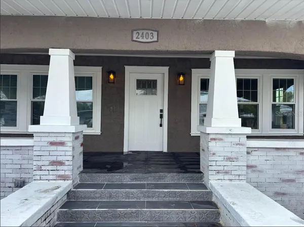 a front view of a house with windows