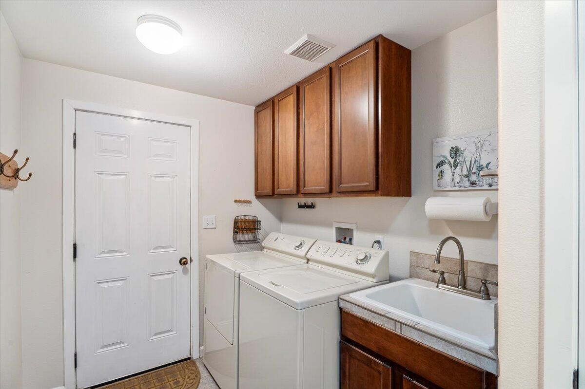 53249 Andrews Road La Pine, OR 97739 - Photo 23 of 49 Laundry Room- Access to attached Garage