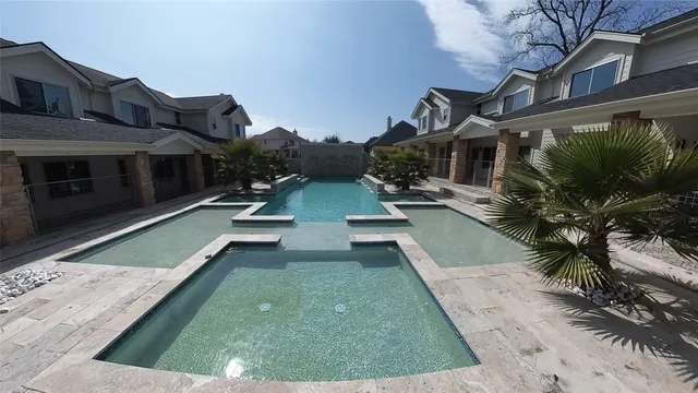 a view of house with yard entertaining space