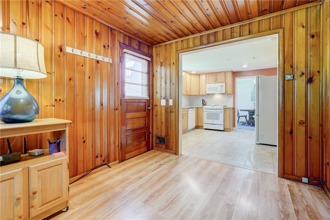 200 Klink Road Brighton, NY 14625 - Photo 11 of 23 family room leads to deck