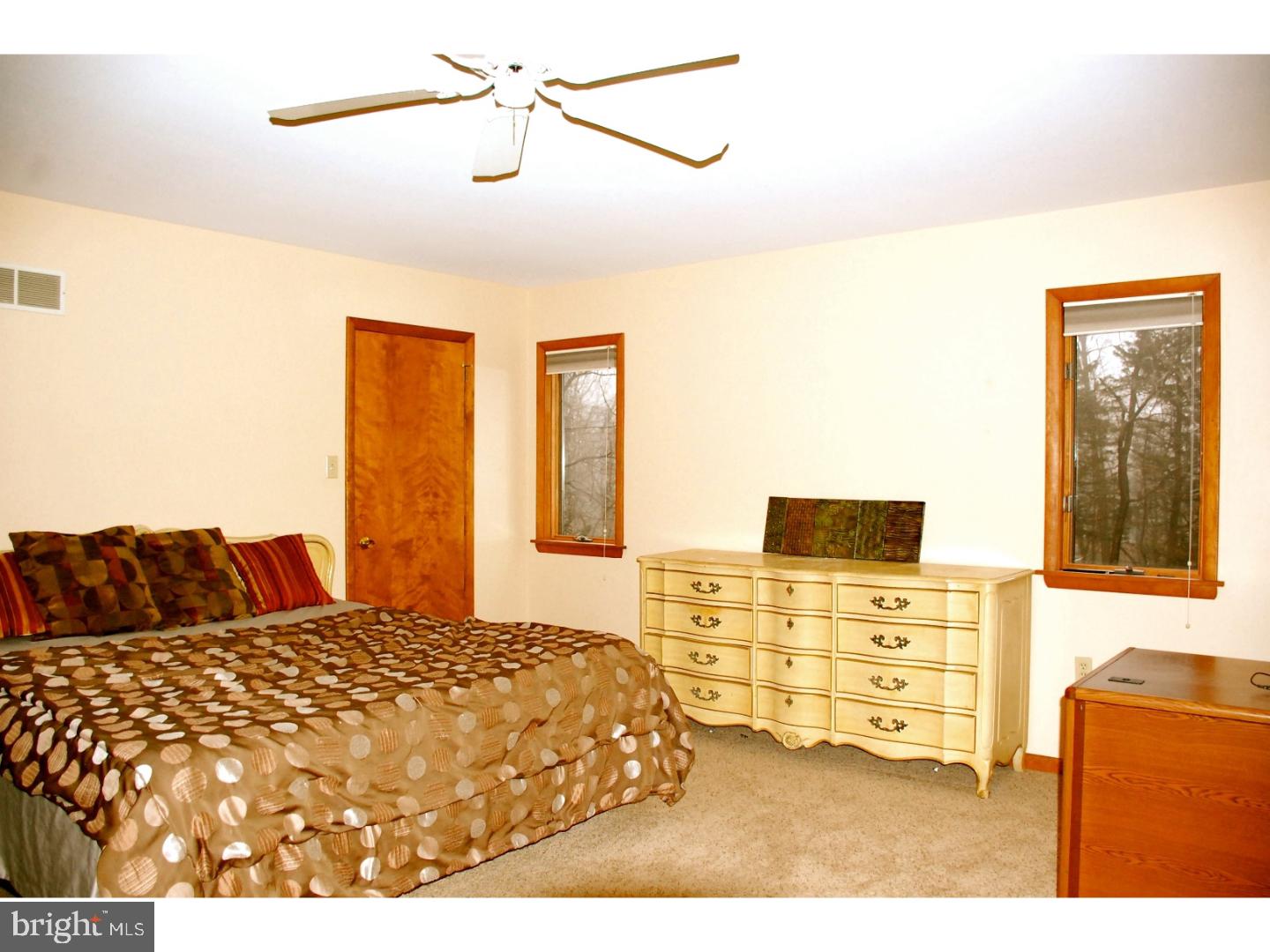 163 Mail Rte Road Sinking Spring, PA 19608 - Photo 19 of 25 a bedroom with a bed and a television