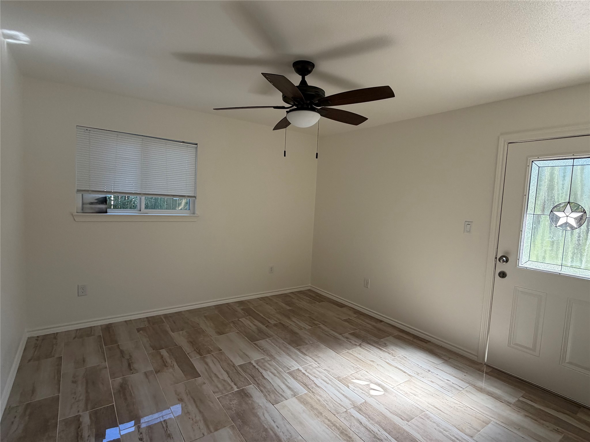 301 Sheraton Avenue Austin, TX 78745 - Photo 9 of 27 Bedroom one with great natural light and direct access to your beautiful backyard and pool area.