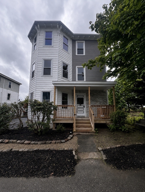 19 Reeves Street Worcester, MA 01607 - Photo 1 of 30 a view of house with yard and sitting area