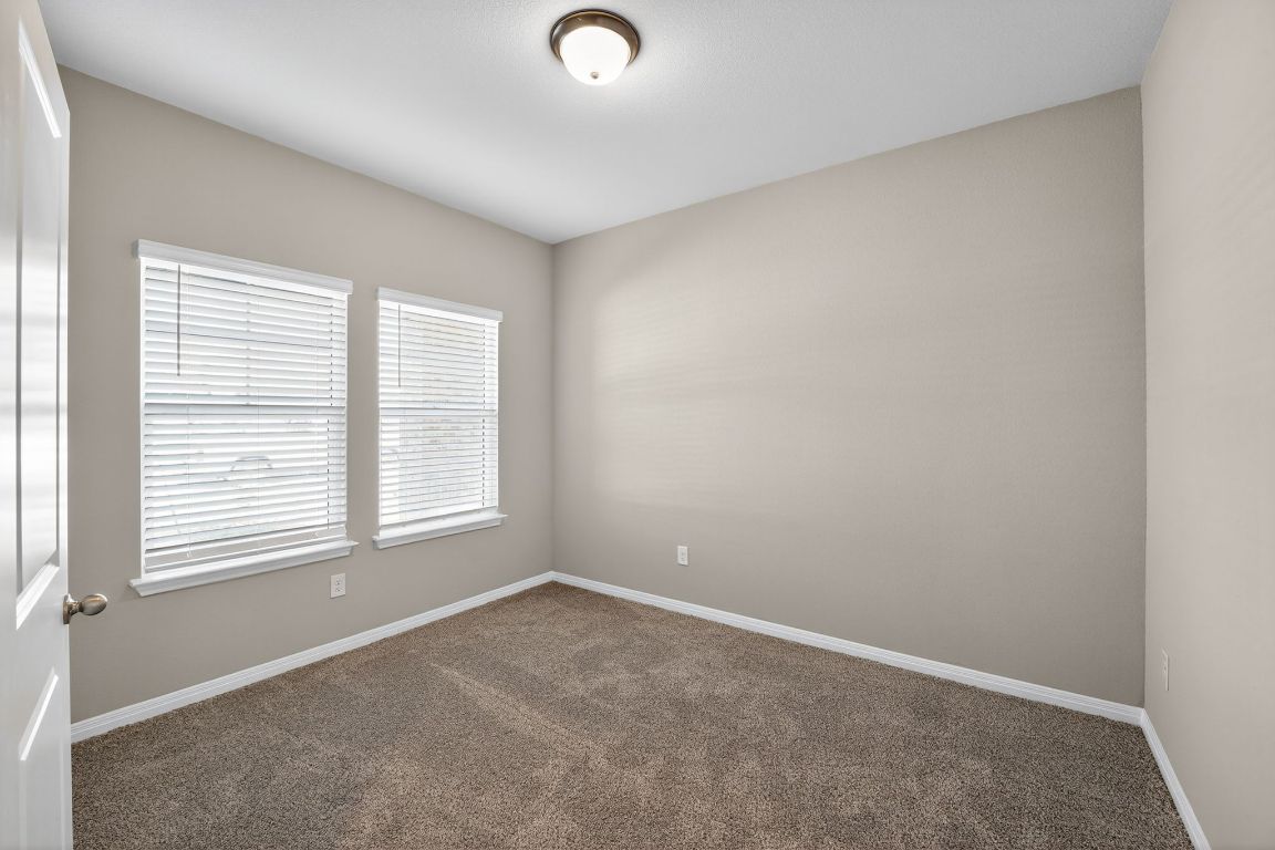 17801 Prairie Land Way Manor, TX 78653 - Photo 14 of 31 an empty room with a window