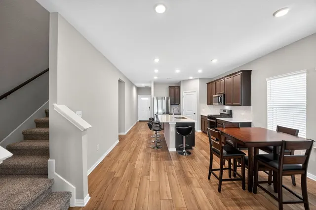 a view of a dining room with furniture