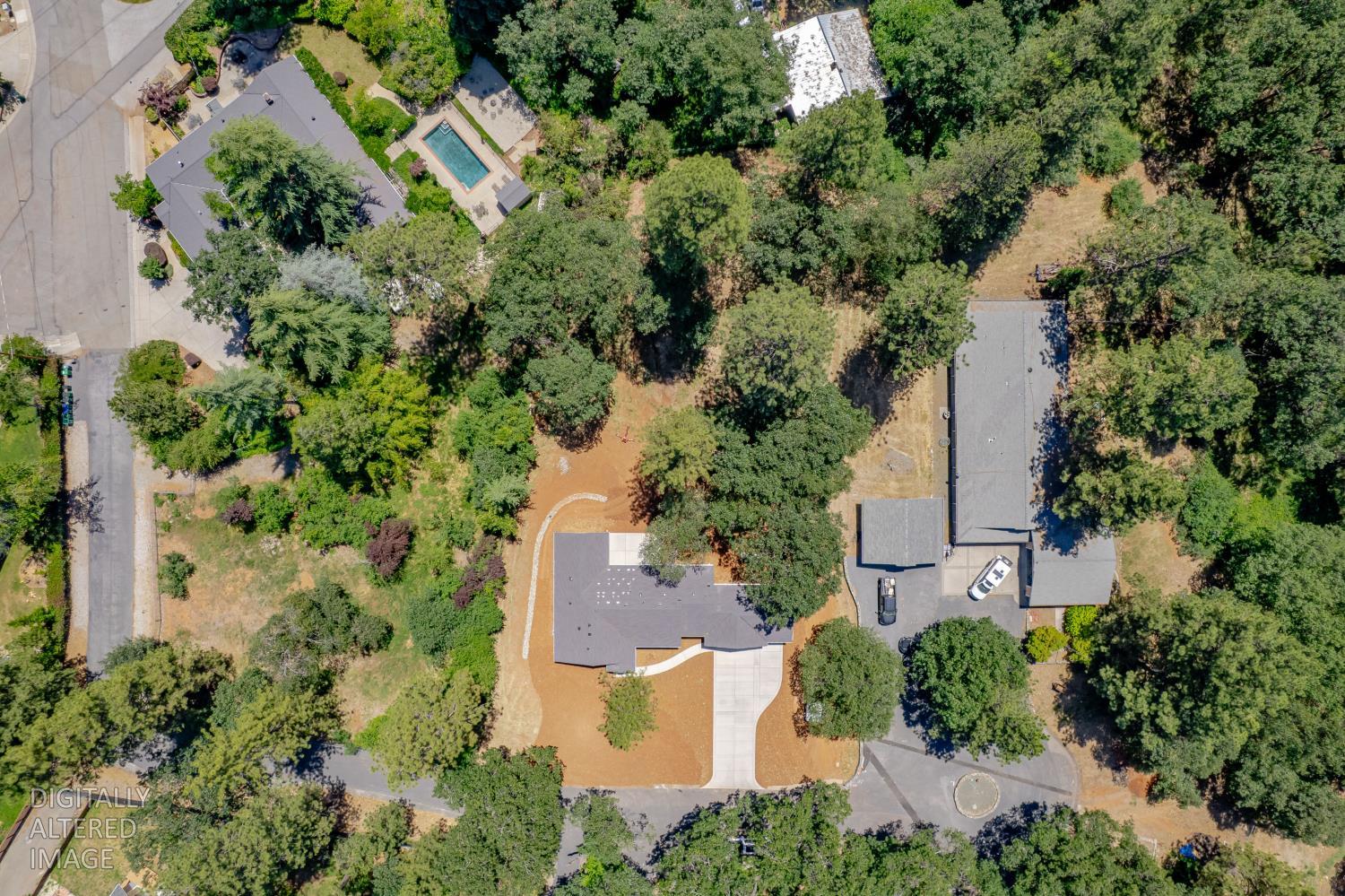 280 Jan Road Grass Valley, CA 95945 - Photo 45 of 66 an aerial view of a house with outdoor space and trees all around