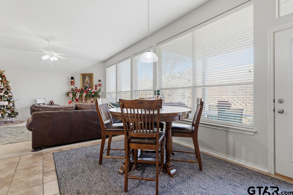5821 Thompson Place Tyler, TX 75707 - Photo 16 of 34 a view of a dining room with furniture