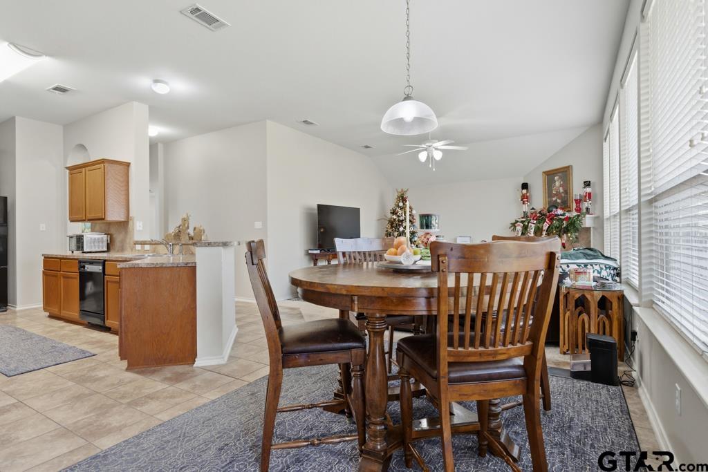 5821 Thompson Place Tyler, TX 75707 - Photo 17 of 34 a view of a dining room with furniture
