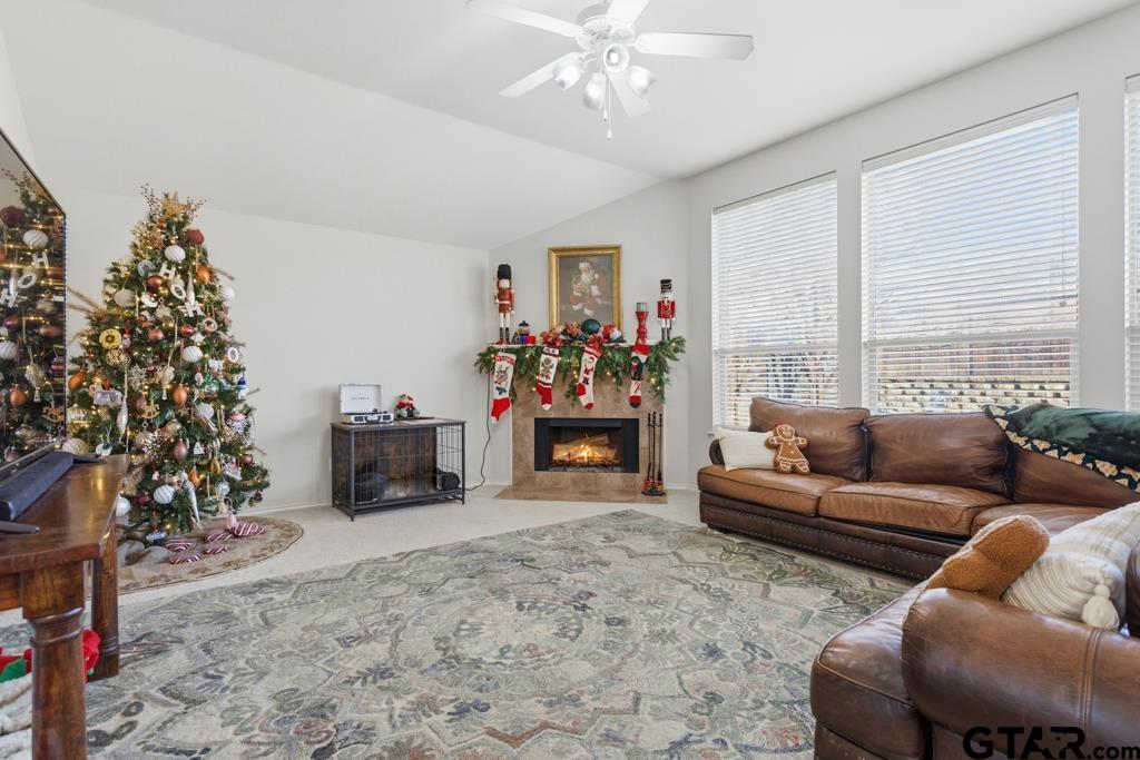 5821 Thompson Place Tyler, TX 75707 - Photo 3 of 34 a living room with furniture and a large window