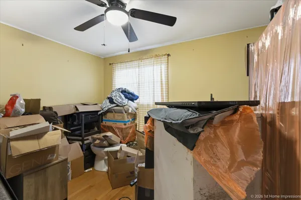 a bedroom with furniture and windows