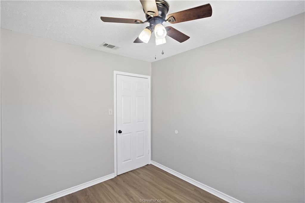 1907 Orman Street Bryan, TX 77801 - Photo 11 of 20 an empty room with a fan and a fan
