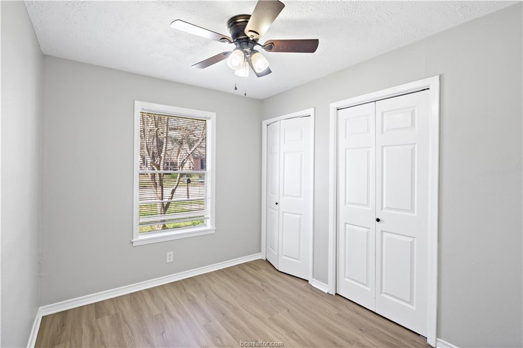 1907 Orman Street Bryan, TX 77801 - Photo 15 of 20 a view of an empty room with a window and wooden floor