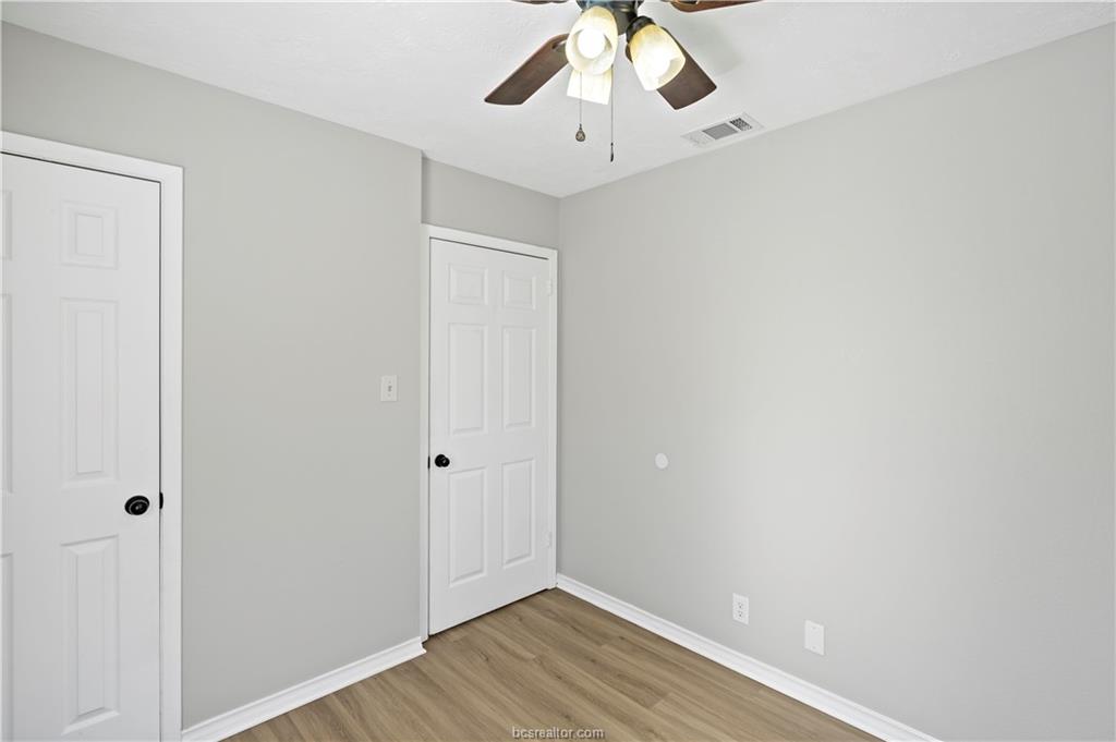 1907 Orman Street Bryan, TX 77801 - Photo 17 of 20 a view of an empty room with wooden floor