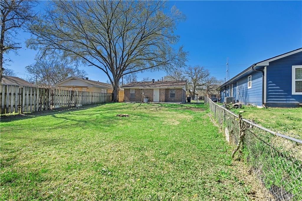 1907 Orman Street Bryan, TX 77801 - Photo 18 of 20 a view of a house with a yard