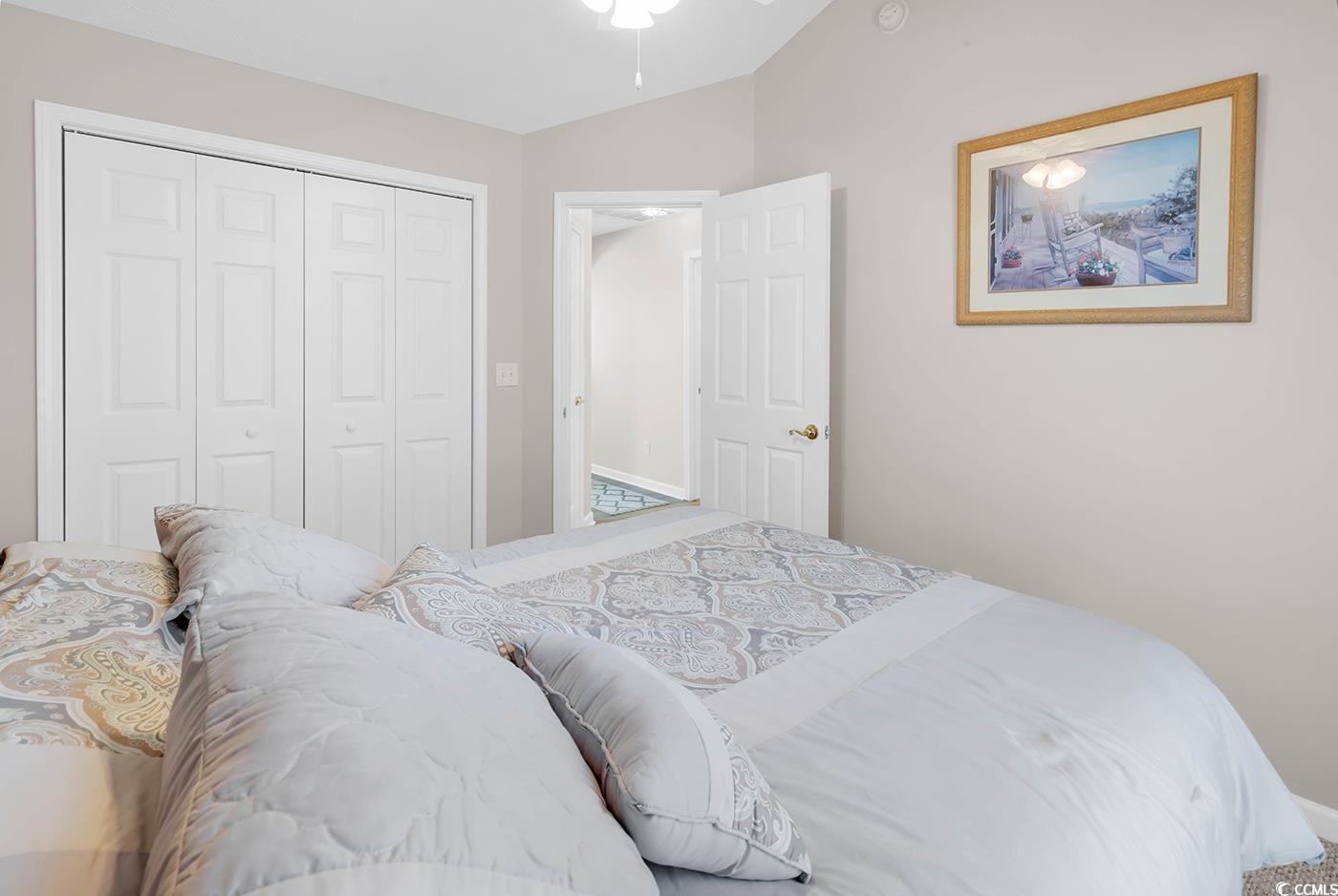 653 Pamlico Court Myrtle Beach, SC 29588 - Photo 26 of 39 Bedroom featuring lofted ceiling and a closet