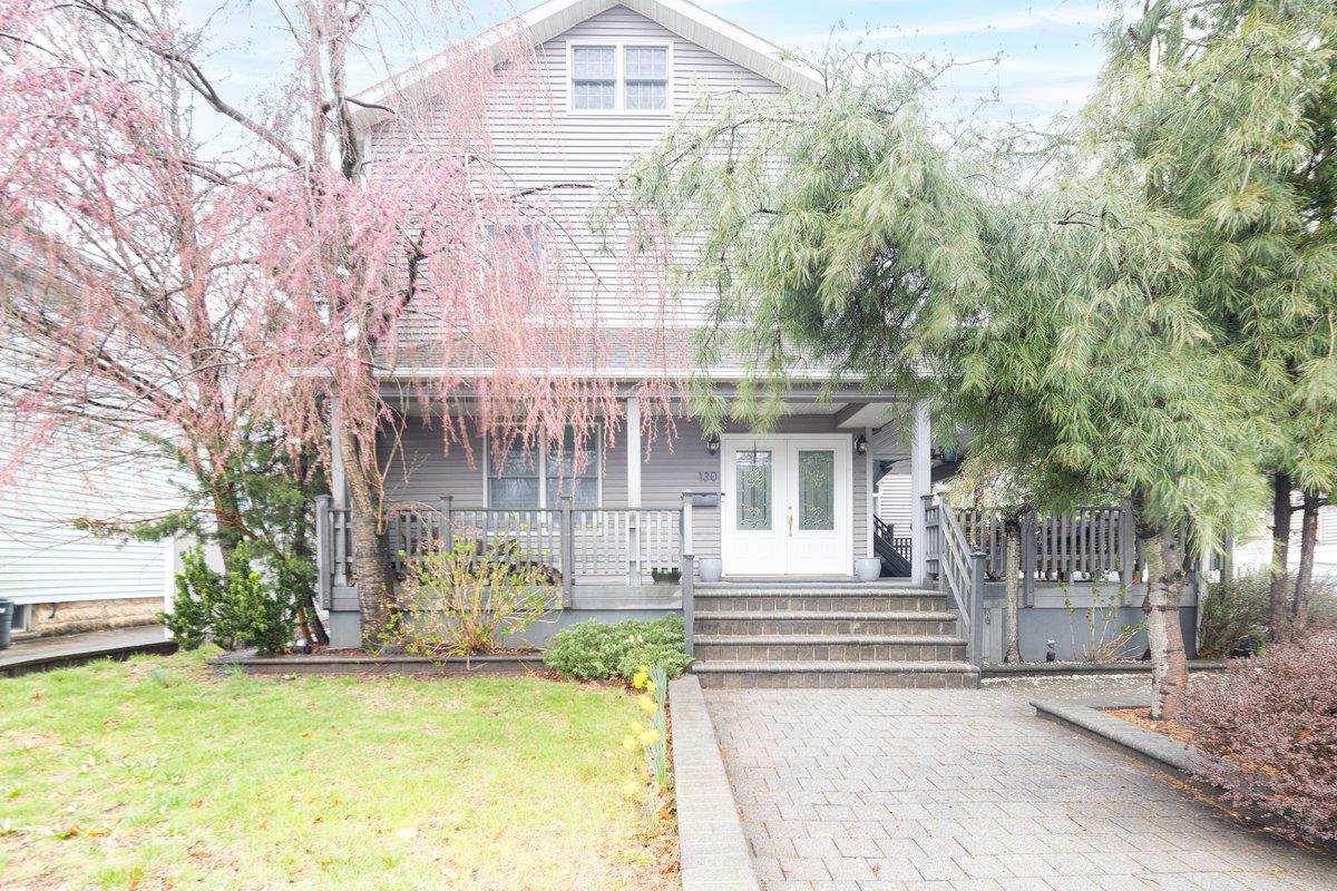 Undisclosed Address Merrick, NY 11566 - Photo 1 of 1 a view of a house with pool and sitting area