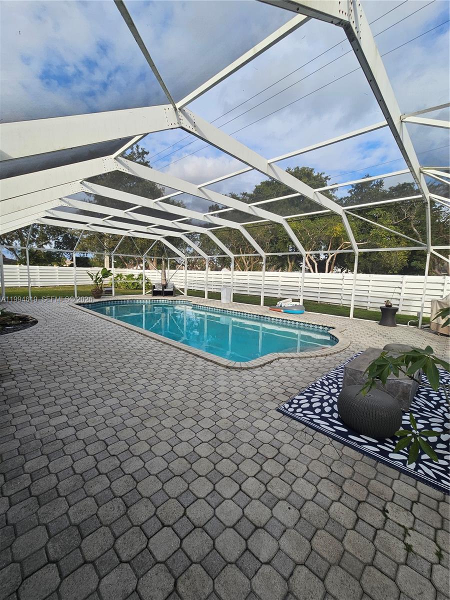 14461 Southwest 152nd Court Miami, FL 33196 - Photo 12 of 14 a view of a backyard