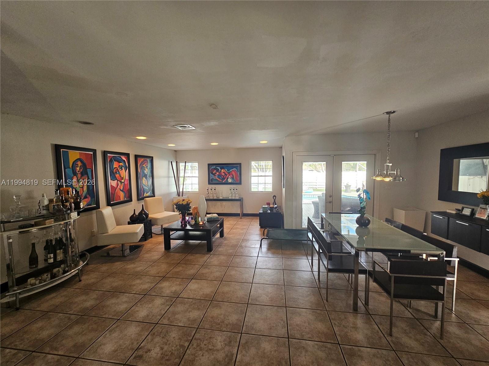 14461 Southwest 152nd Court Miami, FL 33196 - Photo 2 of 14 a living room with furniture