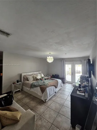 a living room with furniture window and a lamp