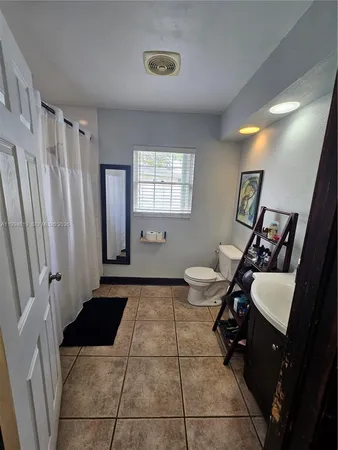 a room with furniture and a window