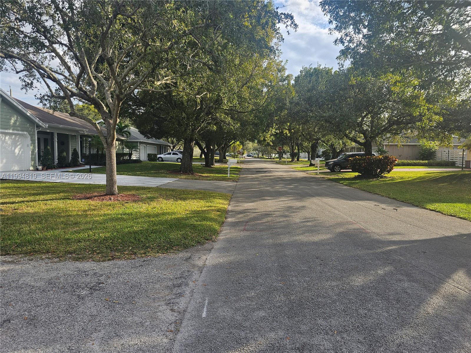 14461 Southwest 152nd Court Miami, FL 33196 - Photo 10 of 14 a view of a house with a yard