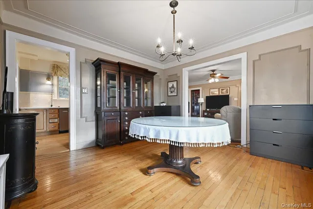 a kitchen with stainless steel appliances sink cabinets and window