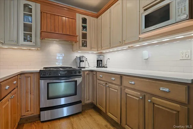 a bathroom with a sink double vanity and a large mirror