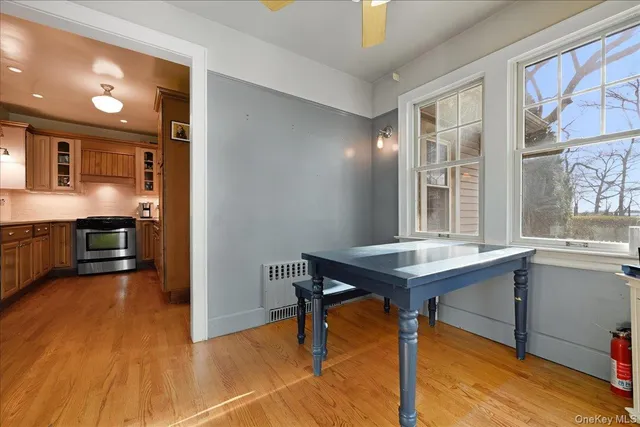 a view of a livingroom with furniture and window