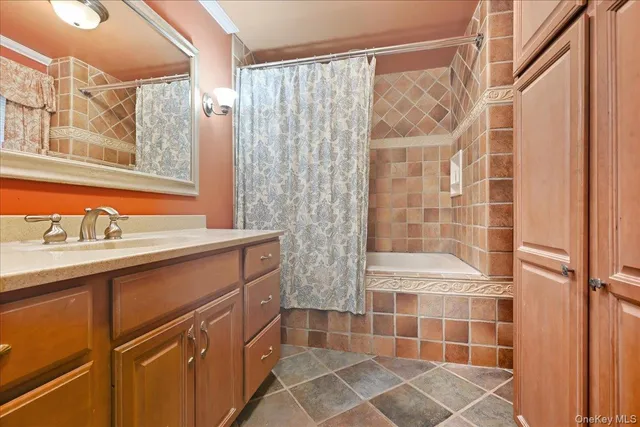 a bathroom with a toilet and shower