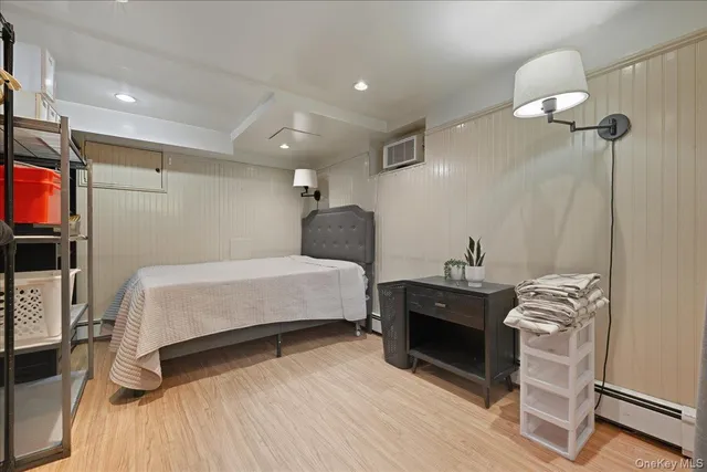 a utility room with cabinets washer and dryer
