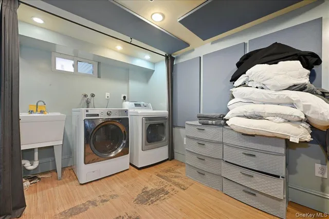 a view of a living room with furniture and clothes