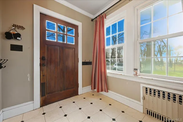 a view of hallway with windows