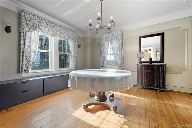 a spacious bathroom with a double vanity sink and a mirror