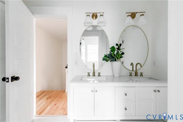 a bathroom with mirror and