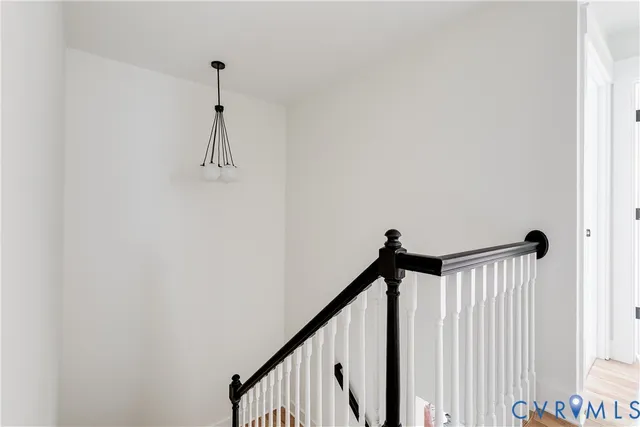 a view of a hallway with a window