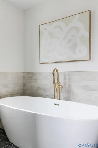 a bathroom with a bathtub