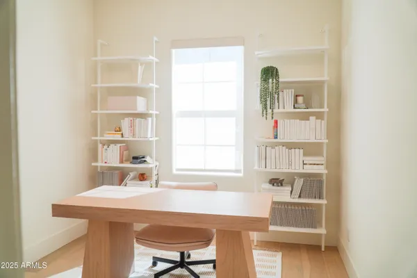 a room with a table and a window