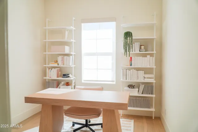 a room with a table and a window