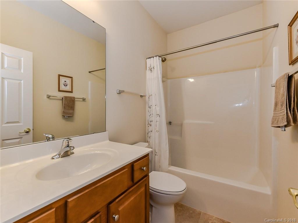 389 Garnet Court Fort Mill, SC 29708 - Photo 22 of 29 a bathroom with a sink toilet and shower