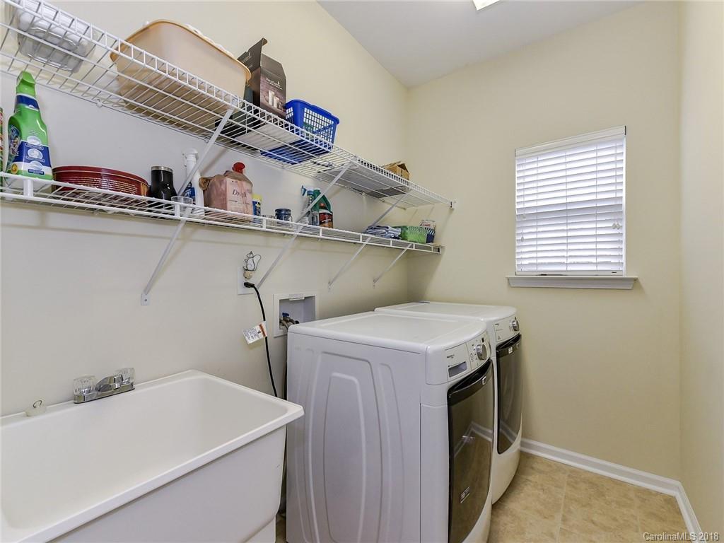 389 Garnet Court Fort Mill, SC 29708 - Photo 23 of 29 a utility room with dryer and washer