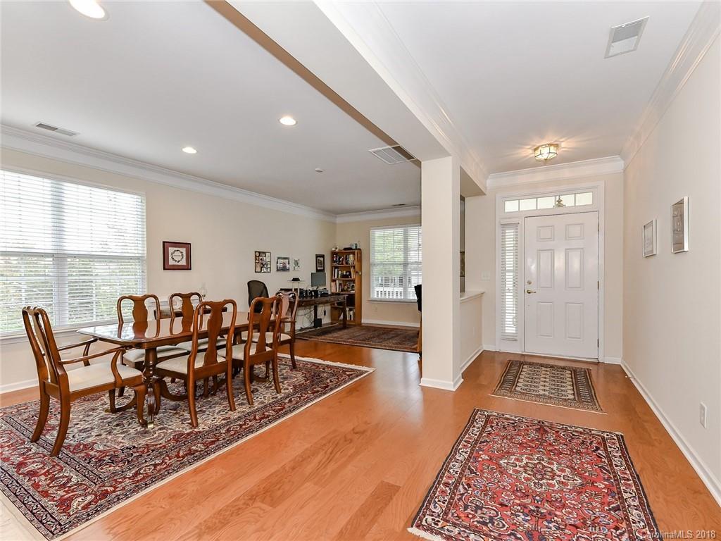 389 Garnet Court Fort Mill, SC 29708 - Photo 4 of 29 a view of a dining room with furniture