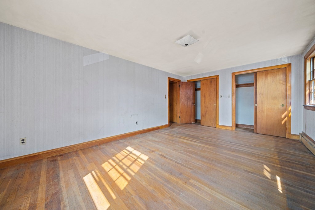 16 Magdala Street Boston, MA 02124 - Photo 15 of 22 a view of an empty room and window