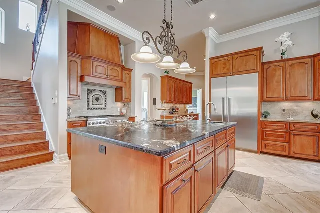 a kitchen with a stove and a microwave