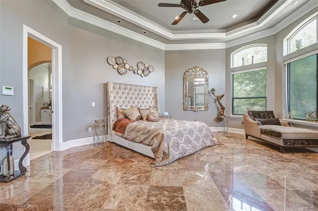 a bathroom with a granite countertop sink mirror and vanity
